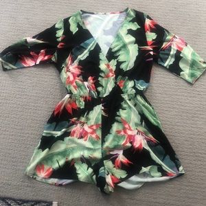 NWOT never worn floral romper size large.